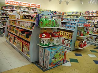 Торговая стойка для детских товаров и игрушек